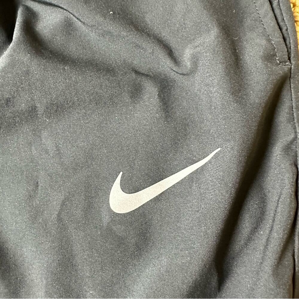 Nike Women's DRI-FIT Tapered Track Pants sz L Black Zipper Ankle Running Warm-up - Picture 4 of 6